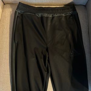 Adidas joggers kids black with dark grey stripe zipper pockets and legs